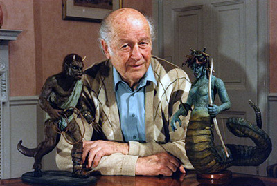 Photo of Ray Harryhausen with stop motion animation models from Clash of the Titans